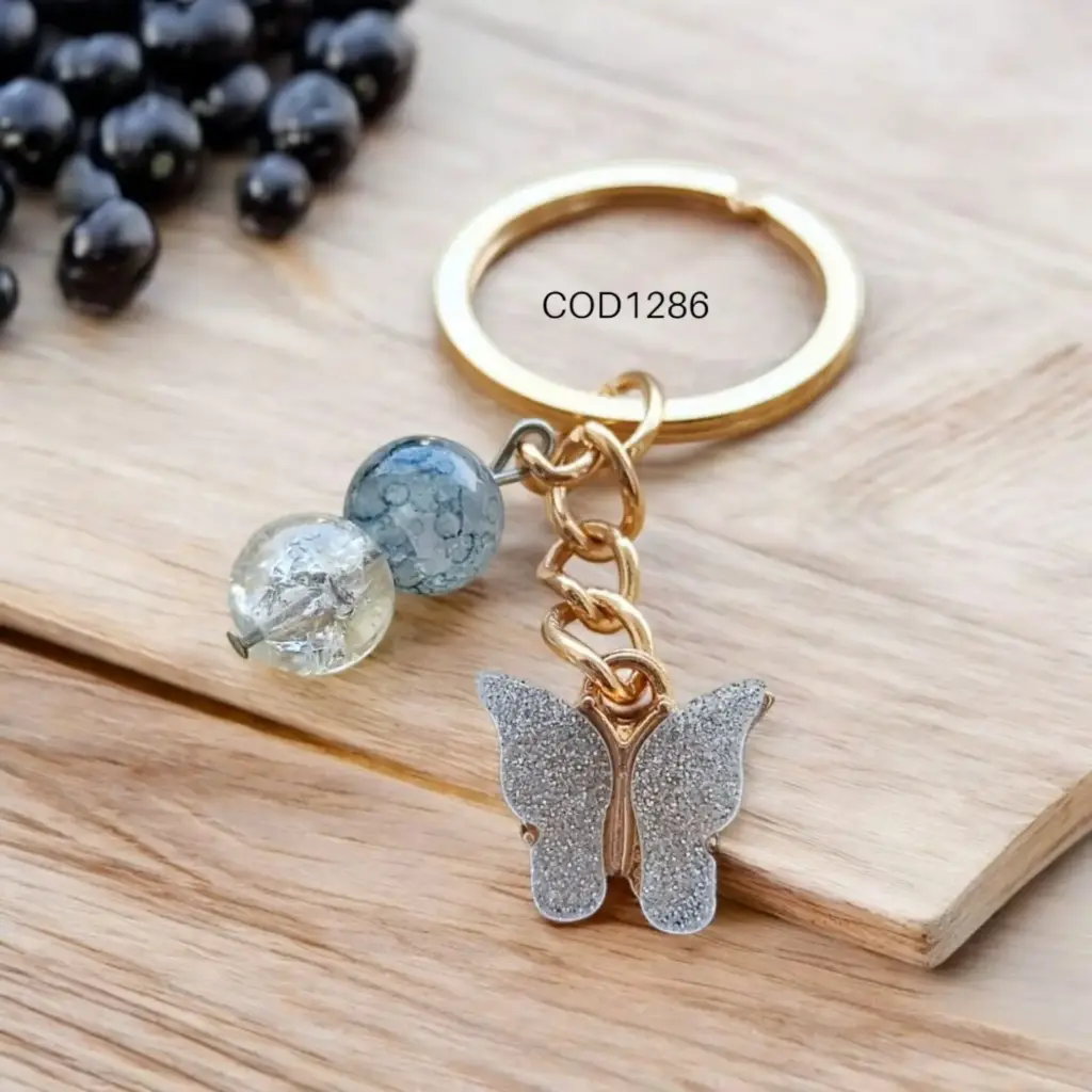 Llavero de mariposa esmaltado con perlas