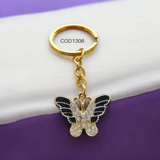Llavero de mariposa negra con piedras