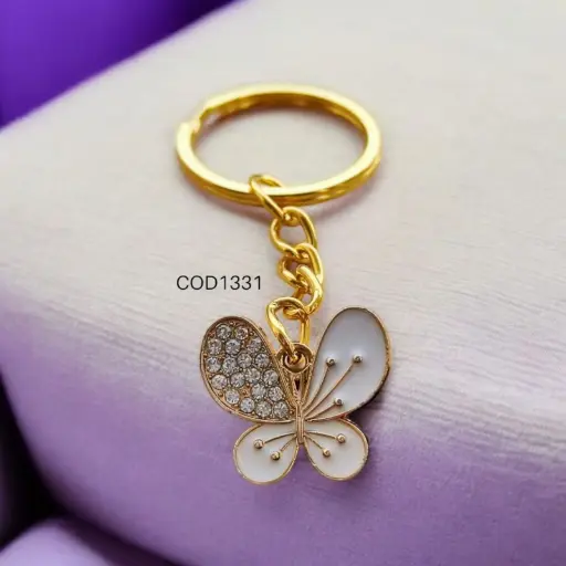 Llavero de mariposa blanca con argolla dorada